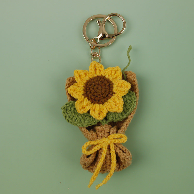 Charm de flor artesanal tejido en crochet