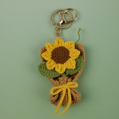 Charm de flor artesanal tejido en crochet