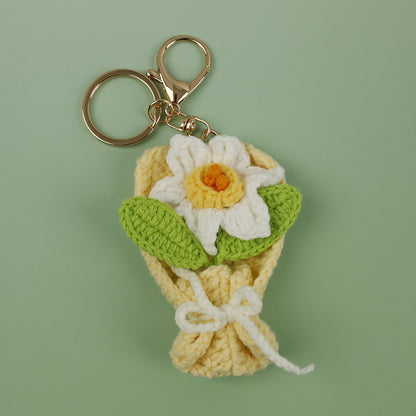 Charm de flor artesanal tejido en crochet