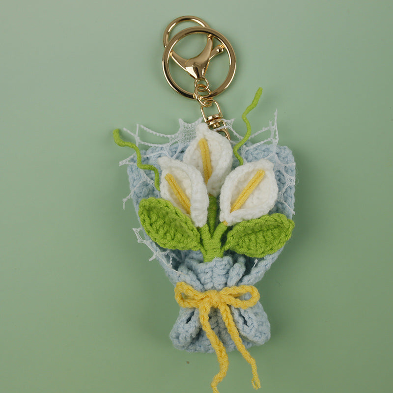 Charm de flor artesanal tejido en crochet