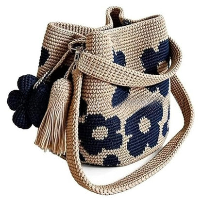 Bolso de mano con flor y borlón